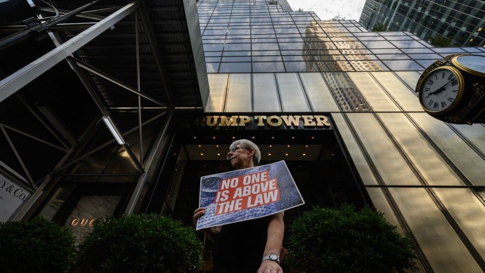 An anti-Trump protester outside Trump Tower in Manhattan on Tuesday