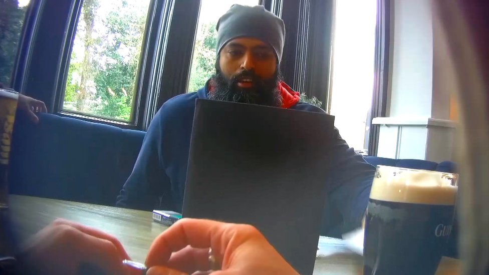 Himesh Shingadia, who set up a Reddit forum which shared women's private images, pictured at a meeting with an undercover reporter