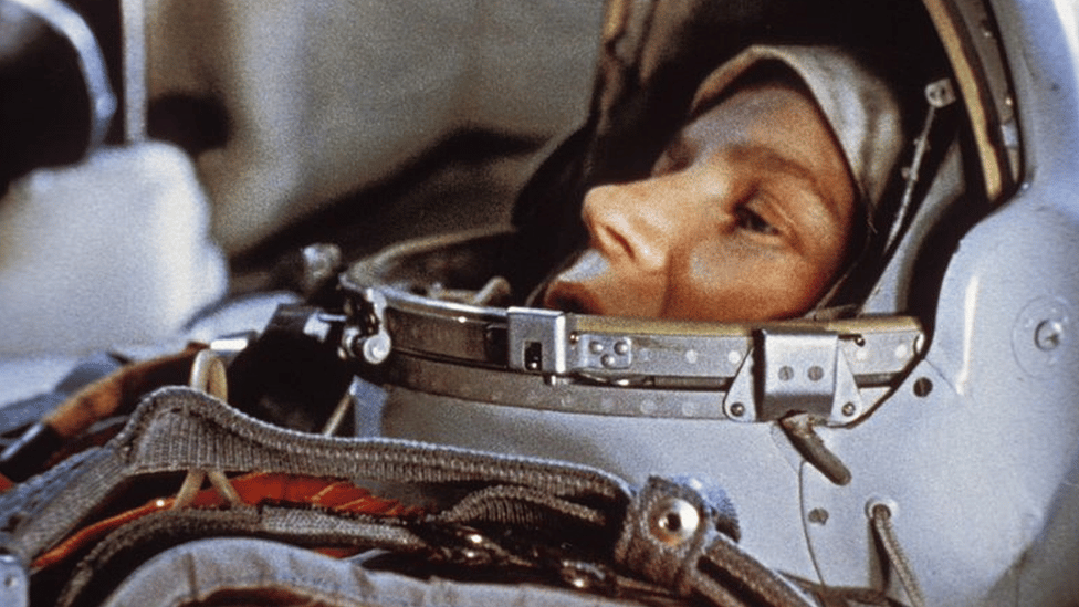Valentina Tereshkova in 1963, inside a space suit with the helmet open, showing her face