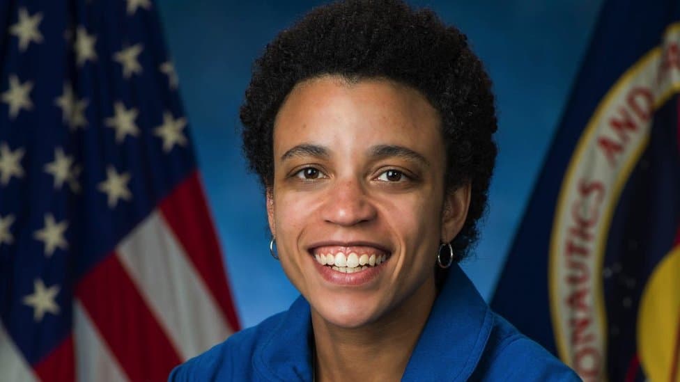 Jessica Watkins next to the US flag in a Nasa publicity photo
