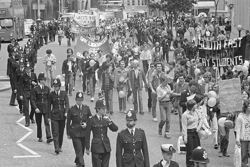 People attend the Pride march in 1979