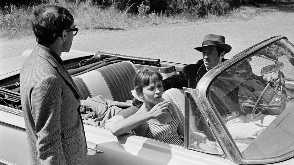 Jean-Luc Godard with Anna Karina and Belmond on the set in 1965
