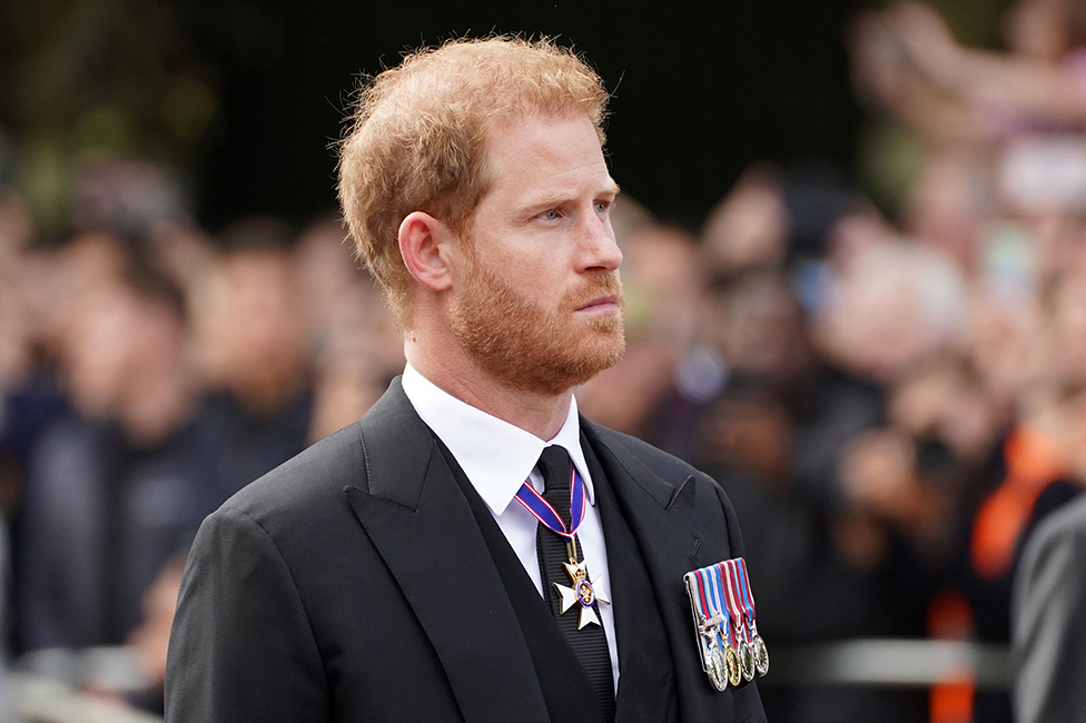 The Duke of Sussex follows the coffin of Queen Elizabeth II during the ceremonial procession from Buckingham Palace to Westminster Hall on 14 September 2022