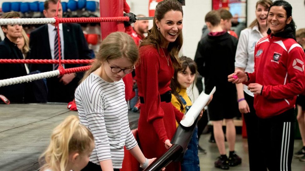 Princess of Wales takes part in a group activity during a visit with Prince William at Bulldogs Development Centre in Port Talbot