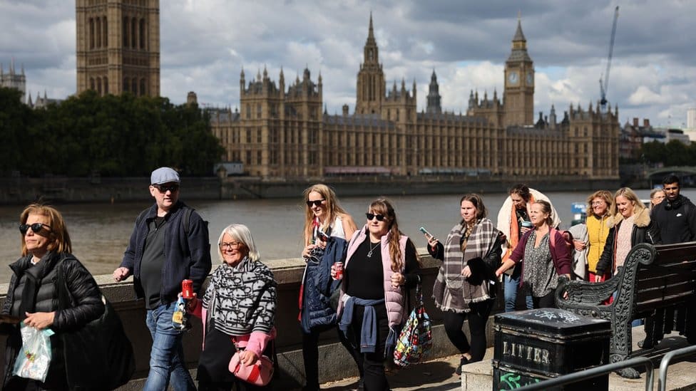 Members of the public in the queue on Lambeth Bridge