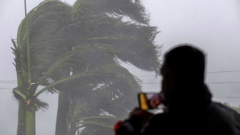 A man live streams as gusts from Hurricane Ian hit in Punta Gorda, Florida on September 28, 2022