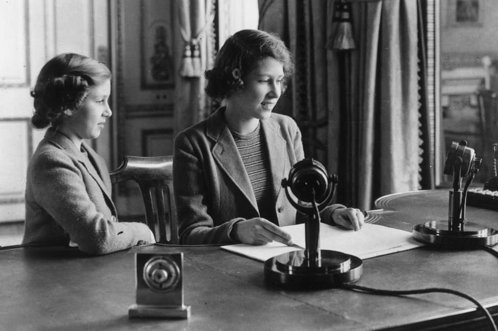 Princess Elizabeth makes her first broadcast, accompanied by her younger sister Princess Margaret Rose 12 October 1940 in London