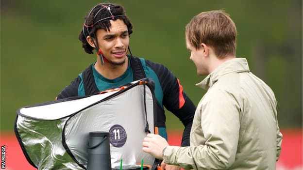 Liverpool's Trent Alexander Arnold wearing a brain scanning device in training