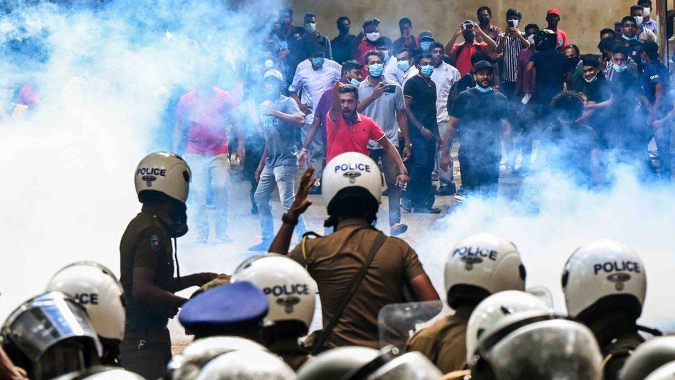 Police use tear gas to disperse students protesting in Sri Lanka's capital Colombo over the country's economic crisis