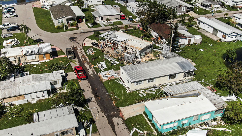 Houses that have been badly damaged in Fort Myers, Florida