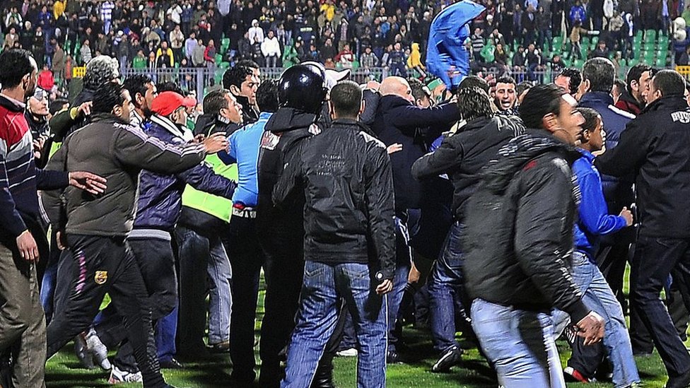 A picture of the mayhem on the pitch at Port Said stadium in 2012