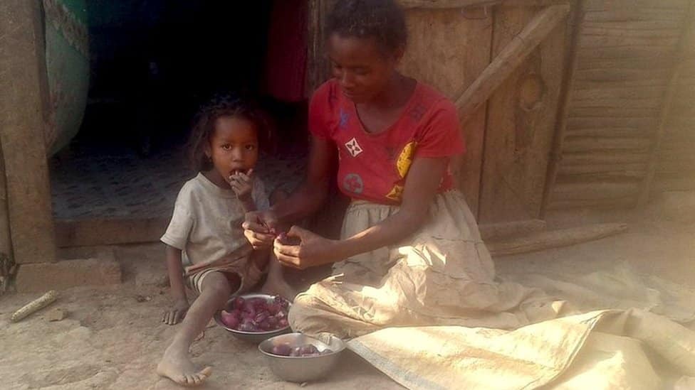 Fefiniaina with her son