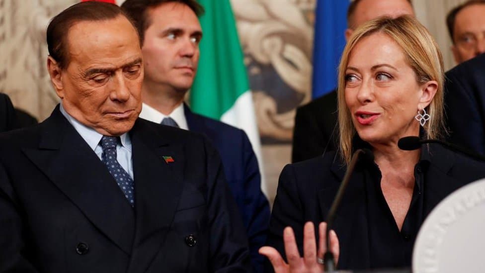 Brothers of Italy leader Giorgia Meloni speaks to the media as she stands next to Forza Italia leader and former Prime Minister Silvio Berlusconi, following a meeting with Italian President Sergio Mattarella at the Quirinale Palace in Rome, Italy October 21, 2022