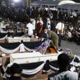 Kremirano 37 žrtava masakra na Tajlandu (FOTO) 11