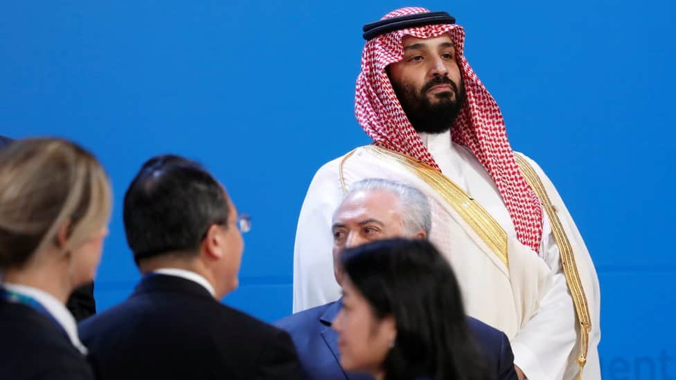 Saudi Crown Prince Mohammed bin Salman looks out as leaders arrive for a family photo at the G20 in Buenos Aires
