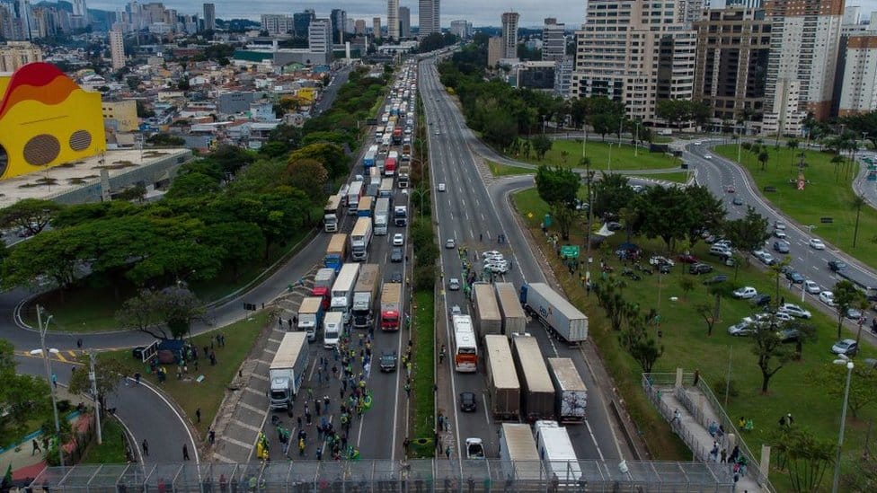 A long line of trucks take part in a blockade in protest over President Jair Bolsonaro's defeat in Brazil's general election on a highway on the outskirts of Sao Paulo on 2 November