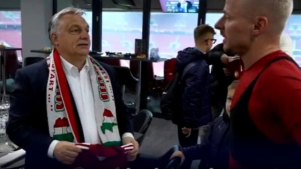 Viktor Orban (L) wearing Greater Hungary scarf - video grab