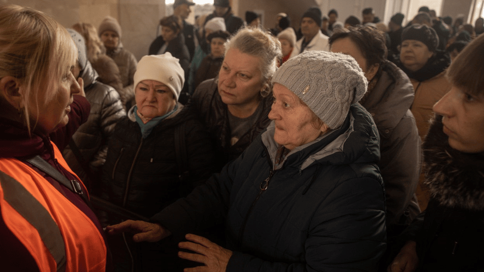 Kherson residents at the railway station, waiting to be evacuated