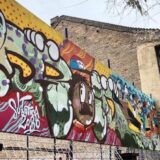 Očišćena i oslikana dotrajala reklamna tabla na subotičkoj školi 1