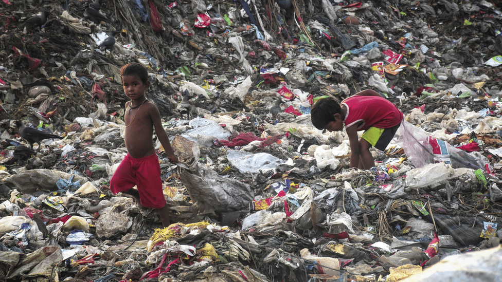 Children in Bangladesh are employed to pick through rubbish at a dump in Bangladesh.