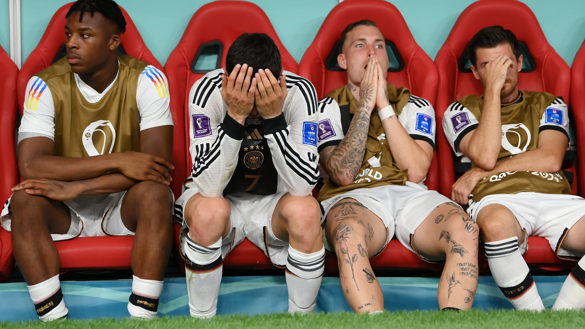Germany substitutes look dejected - with Kai Havertz holding his head in his hands