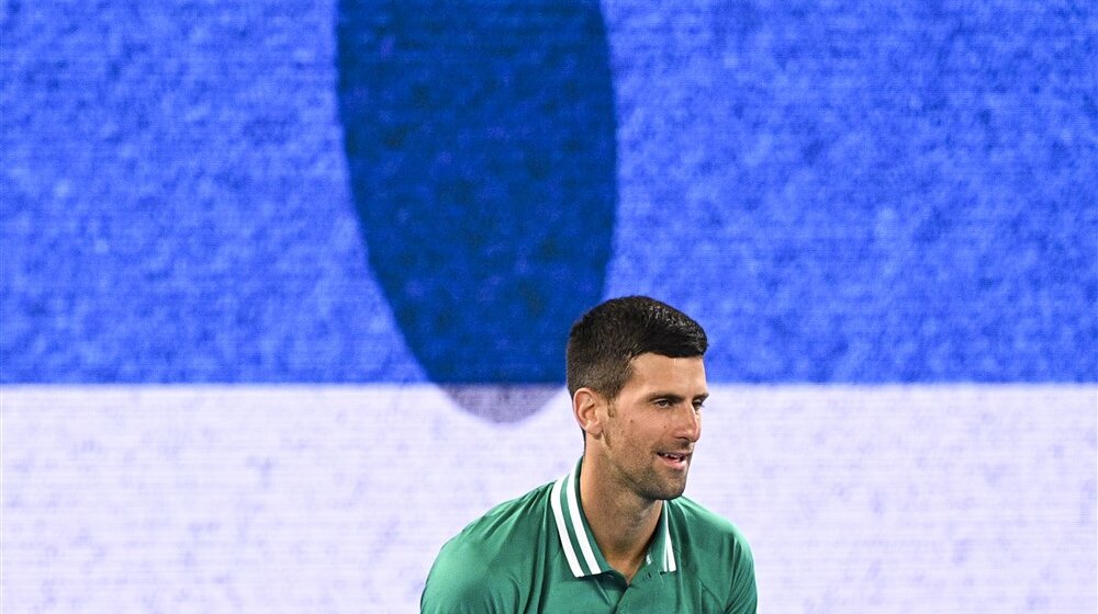 (FOTO) Raspoloženi Đoković odradio prvi trening u Australiji, razdragani domaćin sve ispratio 1