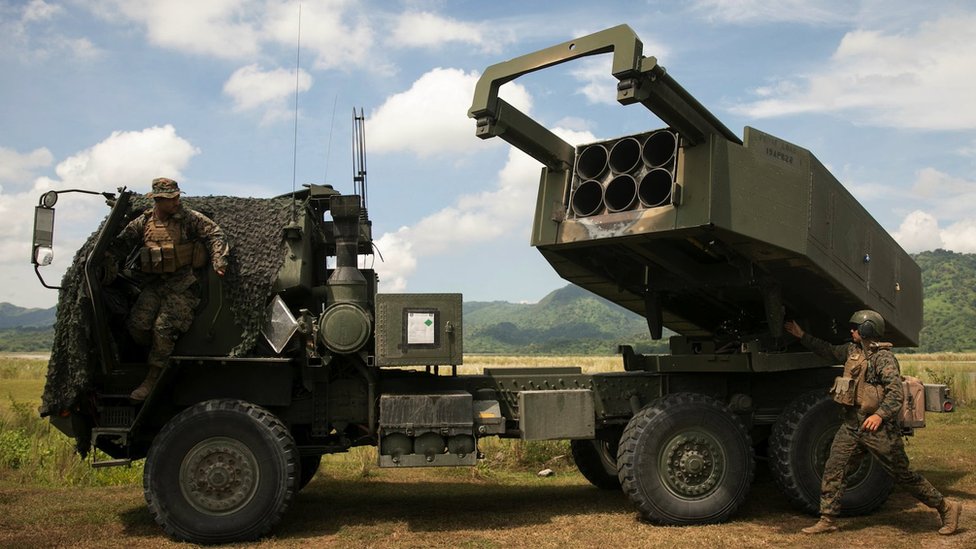 US Marines check the M142 High Mobility Artillery Rocket System (Himars) after live fire exercises in the Philippines