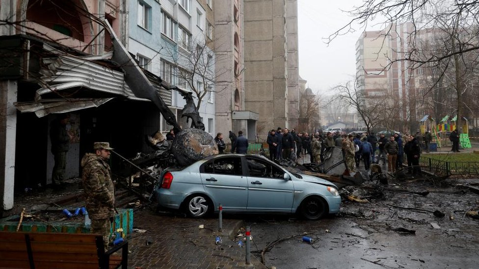 A view shows the site where a helicopter falls on civil infrastructure buildings, amid Russia's attack on Ukraine, in the town of Brovary, outside Kyiv, Ukraine, January 18, 2023