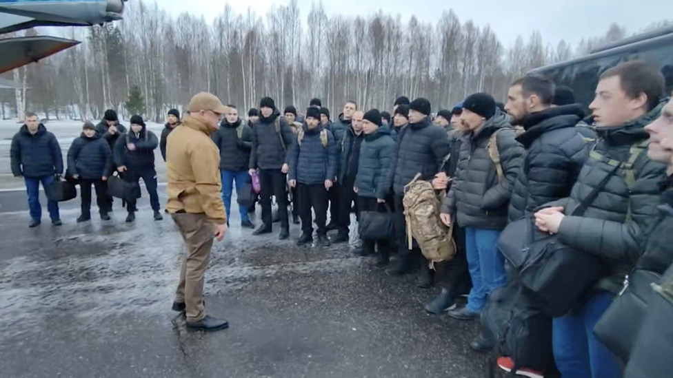 Yevgeny Prigozhin with a group of former prisoners