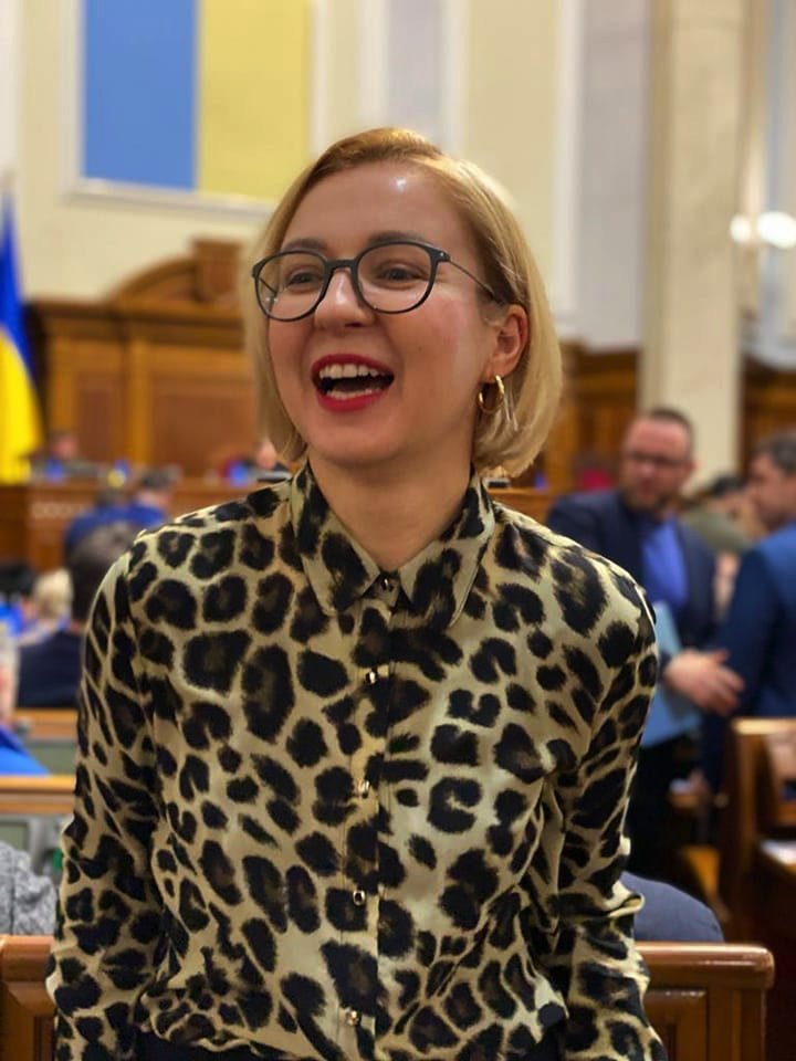 Ukrainian MP Inna Sovsun wearing a leopard skin shirt and smiling