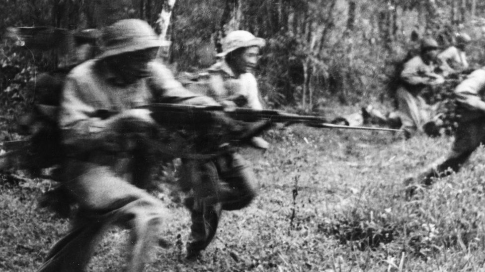 Viet Cong soldiers charging the enemy in South Vietnam, 1968.