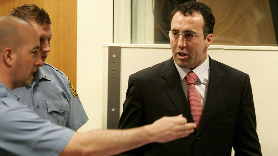 Former Kosovan prime minister Ramush Haradinaj enters court in The Hague, 2005
