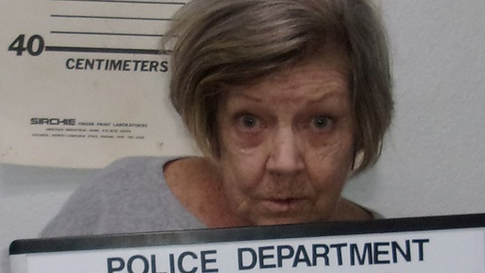 The mugshot of a woman charged with a bank robbery.