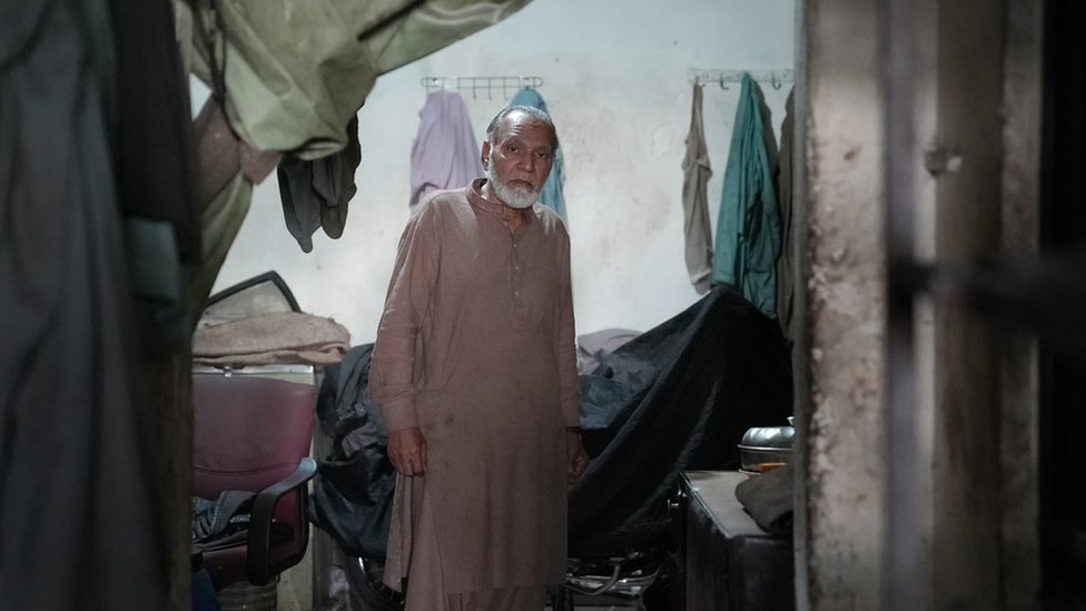 Portrait of Pakistani man aged 68