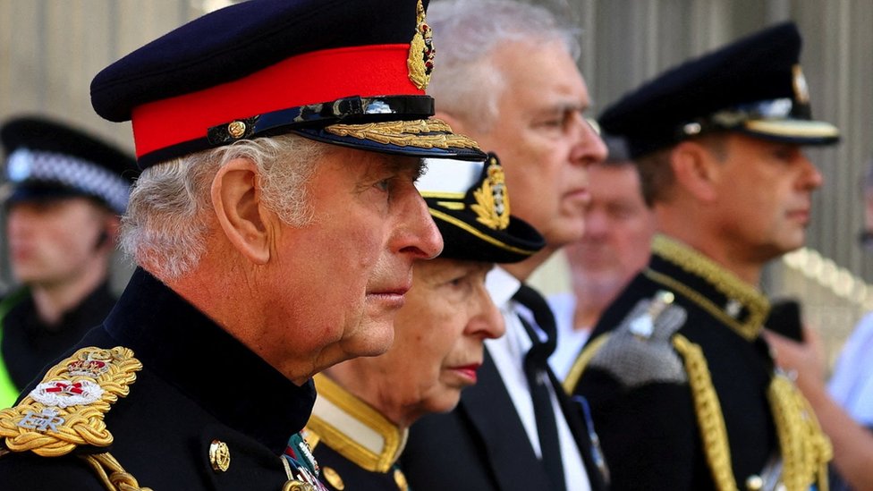The Royal Family - Charles, Anne, Andrew, and Edward - standing in a line at the Queen's funeral.