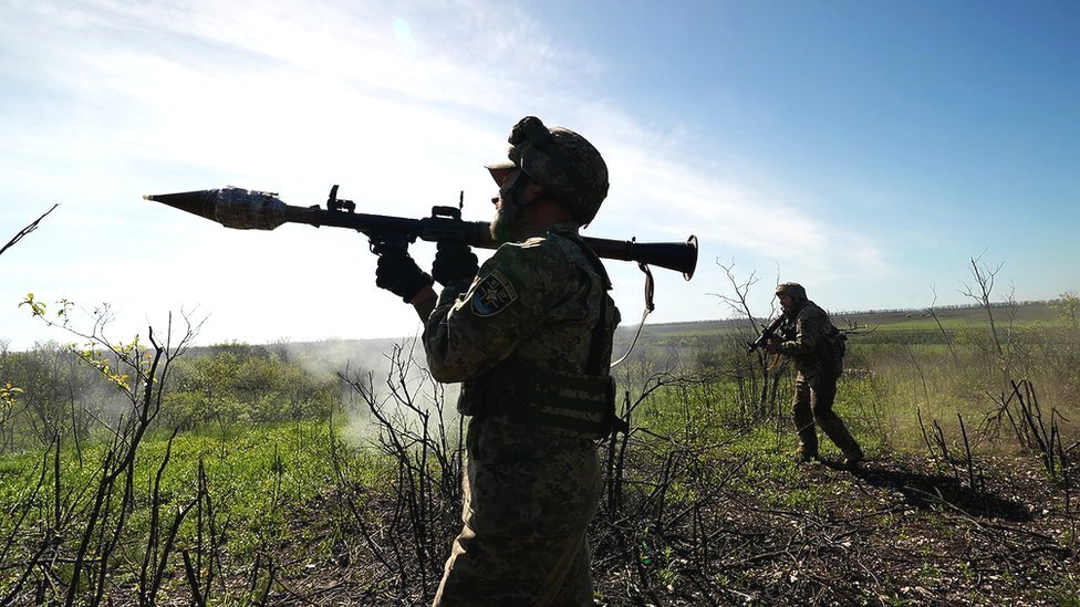 A member of the Ukrainian military prepares to fire a rocket-propelled grenade (RPG) near the city of Bakhmut