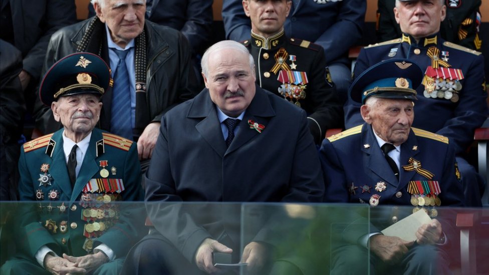 Alexander Lukashenko appears tired during last week's Victory Day parade in Moscow, his right arm in a bandage.  May 9, 2023