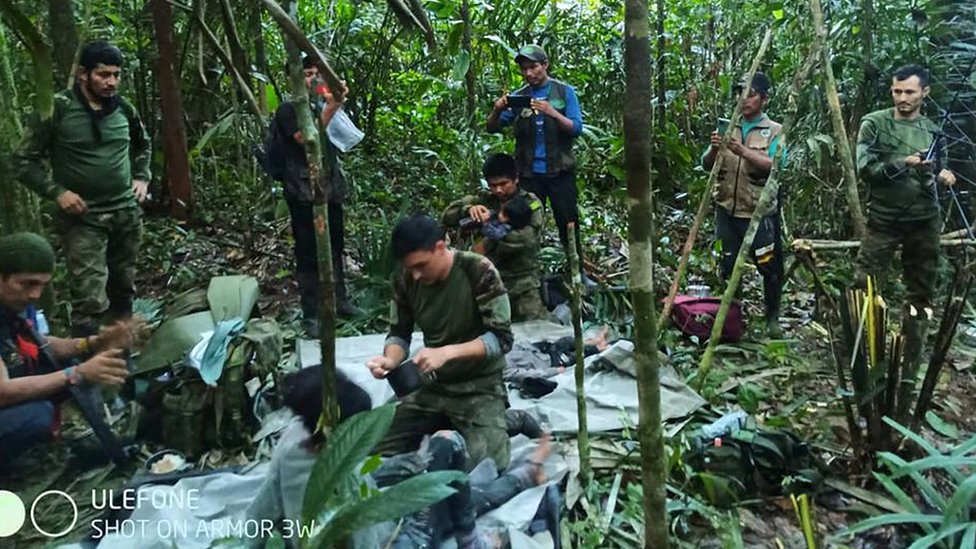 Colombian military soldiers attend to child survivors from a Cessna 206 plane that crashed on May 1 in the jungles of Caqueta, in limits between Caqueta and Guaviare, in this handout photo released June 9, 2023