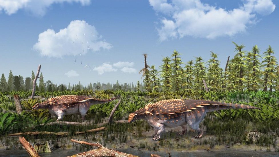Velika Britanija: Otkrivena nova vrsta dinosaurusa na ostrvu Vajt 2 A CGI rendering of two dinosaurs next to a body of water.