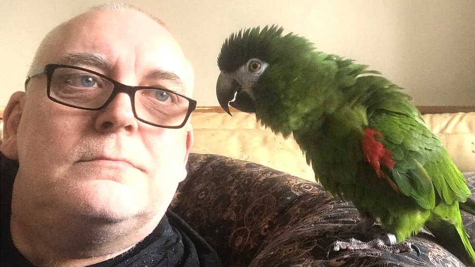 Steve Wood and a parrot