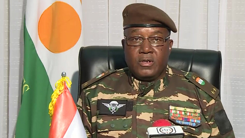 General Abdourahmane Tiani (has also been referenced as Abdourahmane Tchiani and Omar Tchiani) makes a televised address to the nation of Niger explaining the reasons for the coup, 28 July 2023. President Mohamed Bazoum is being held captive by his own guards