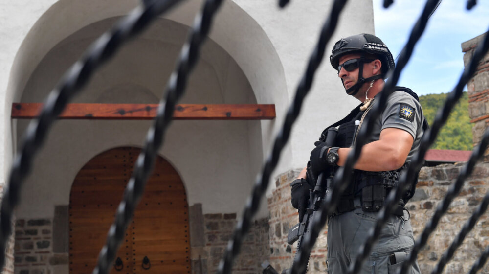 epa10885649 An armed Kosovo Police officer stands guard in front of the Banjska Monastery in the village of Banjska, Kosovo, 27 September 2023. A Kosovar Albanian police officer on 24 September was killed by Serb gunmen who later barricaded themselves in the XIV century Serbian Orthodox Banjska monastery and traded gunfire for hours, Kosovo authorities confirmed. Police regained control of the area late on the same day. The incident came at a fragile moment in the Kosovo - Serbia European Union-facilitated dialogue to normalize ties between the two parties.
