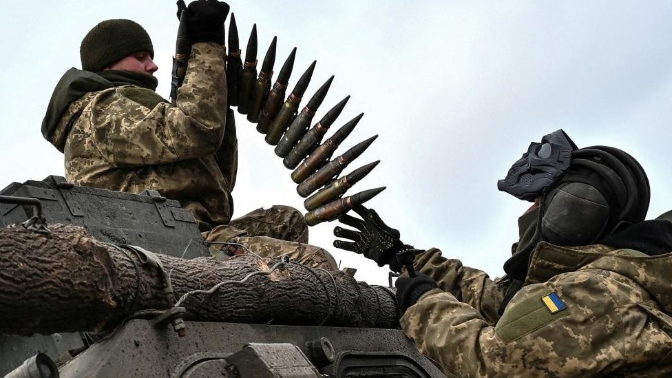 Ukrainian service members load ammunition to an infantry fighting vehicle during offensive and assault drills, amid Russia's attack on Ukraine, in Zaporizhzhia Region, Ukraine January 23, 2023.
