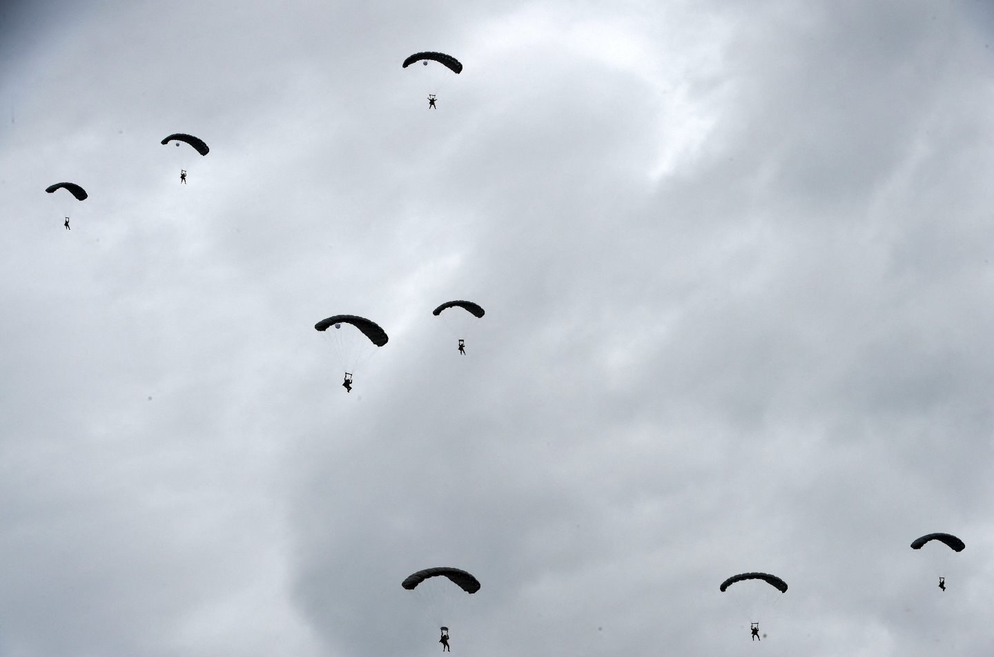 US soldiers parachute from a C 130 Hercule aircraft during the celebrations for the 78th D-Day anniversary, marking the WWII Normandy landings of June 61944 in Sainte-Mere-Eglise on 5 June 5 2022