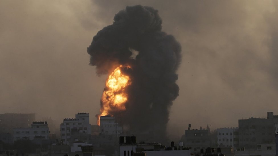 Smoke and flames rise following an Israeli strike on Gaza City
