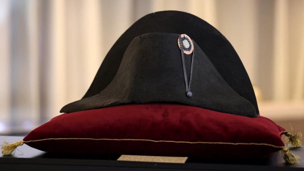 A "black beaver" felt two-cornered hat with an embroidered tricolor cockade belonging to French Emperor Napoleon Bonaparte, from the Collection Jean Louis Noisiez, is displayed before going on auction at Osenat auction house, in Paris, France, November 6, 2023.