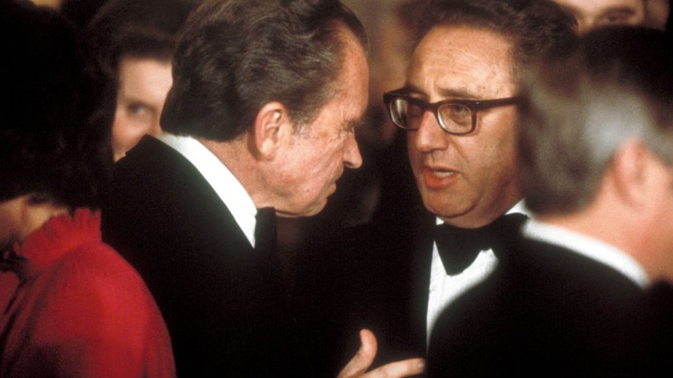 Former Pres. Richard Nixon (1913 - 1994) (L) & his State Secy. Henry Kissinger chatting at reception for Chinese VP Deng Xiaoping during state visit