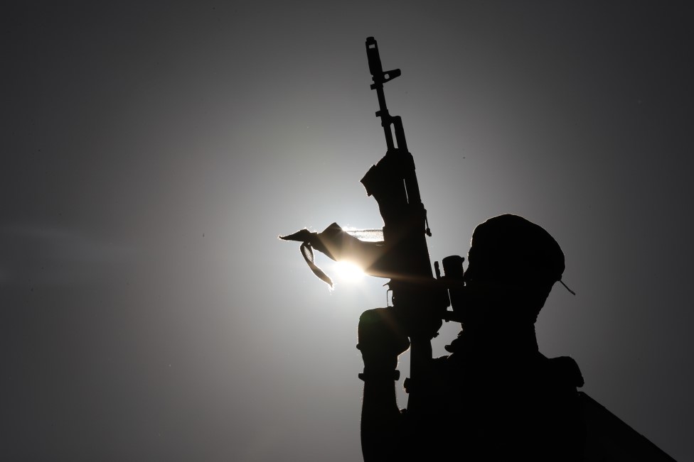 Izrael i Palestinci: Ko je vođa Hamasa Jahja Sinvar 4 Naoružan čuvar na skupu na kome je Sinvar govorio 2021. godine