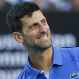 Ne tamo, dečko: Kako je Đoković izveo Prižmića na pravi put do terena "Rod Lejver" arene (VIDEO) 12