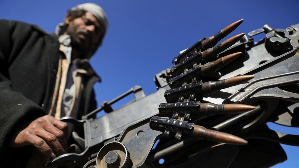 An Houthi follower mans a machine gun on a pick-up truck during a protes, near Sanaa, Yemen on 25 January 2024